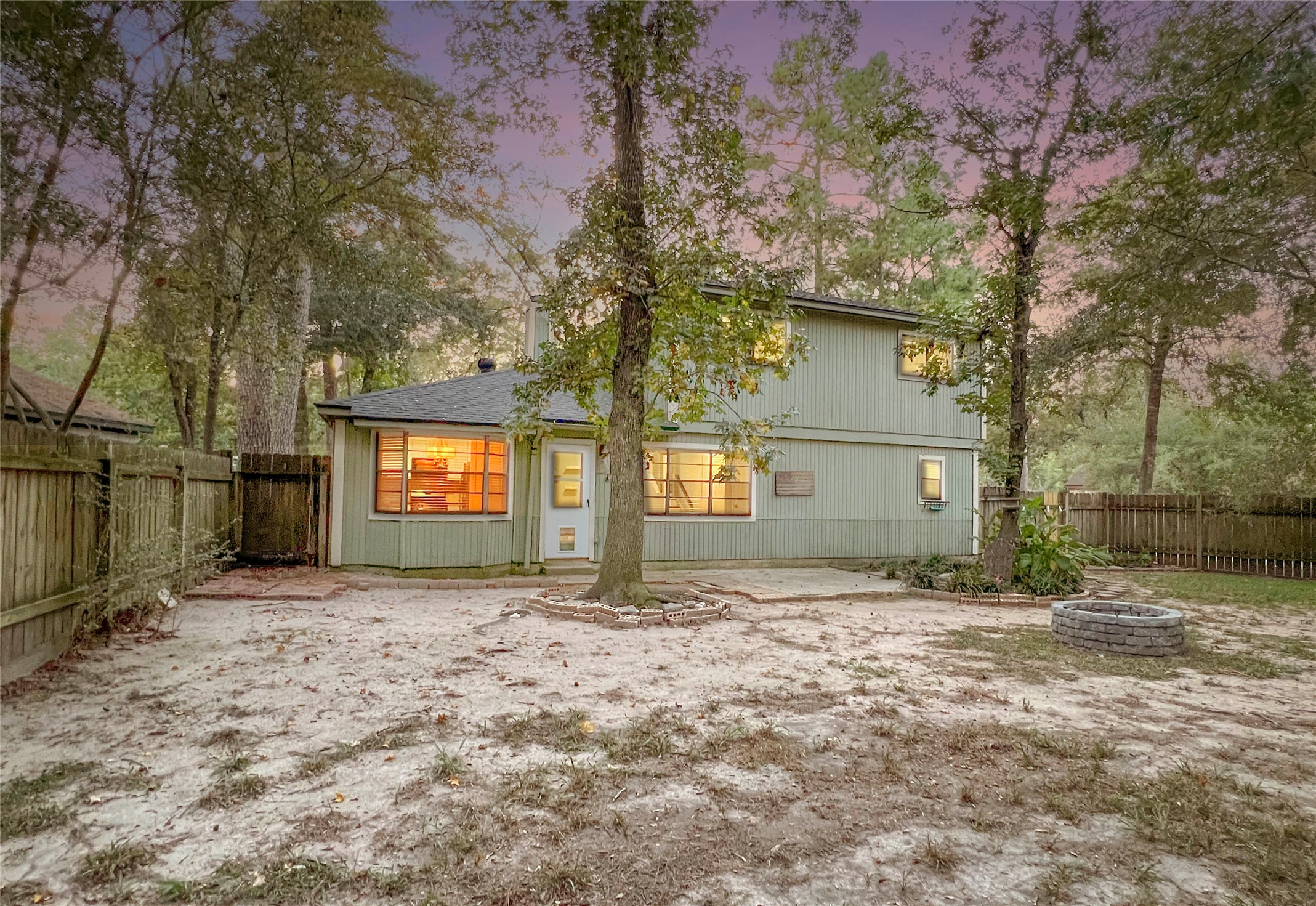 56 East White Willow Circle Spring, TX 77381 - Photo 35 of 45 a house with trees in front of it