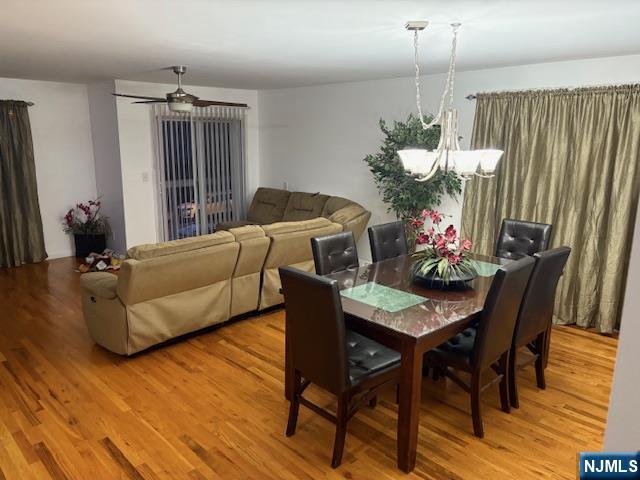 847 Bond Street, Unit 1 Elizabeth, NJ 07201 - Photo 10 of 10 a living room with furniture and a chandelier
