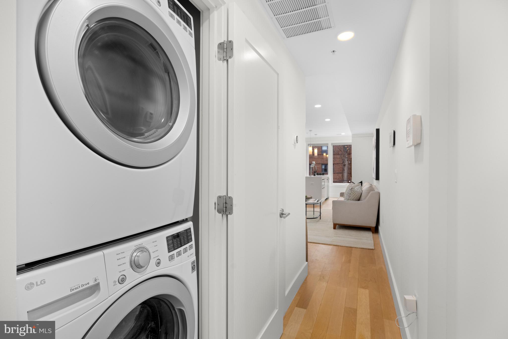 1515 K Street Southeast, Unit 3 Washington, DC 20003 - Photo 7 of 22 a view of a hallway with washer and dryer