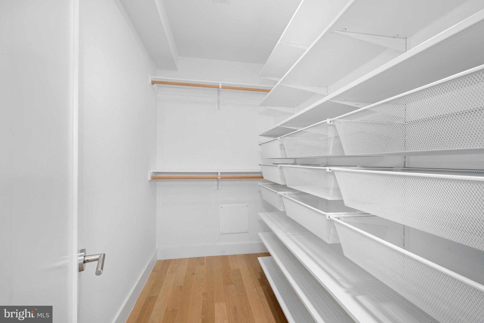 1515 K Street Southeast, Unit 3 Washington, DC 20003 - Photo 10 of 22 a view of a room with racks on the wall