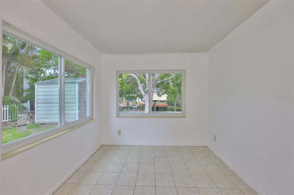 106 West North Branch Road Ruskin, FL 33570 - Photo 17 of 29 an empty room with windows