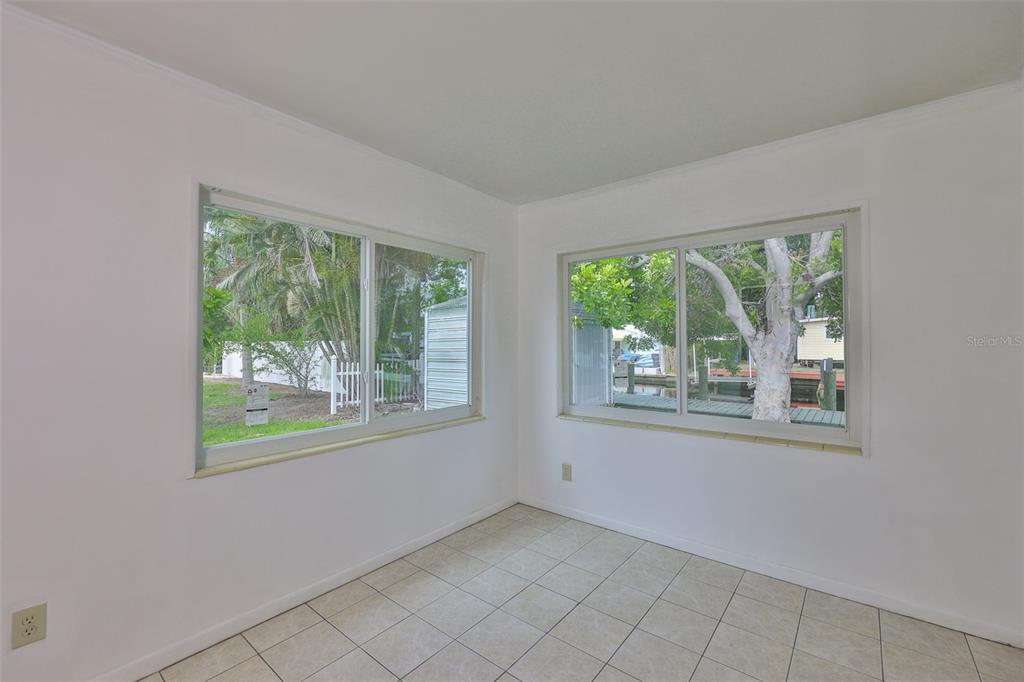 106 West North Branch Road Ruskin, FL 33570 - Photo 18 of 29 an empty room with windows