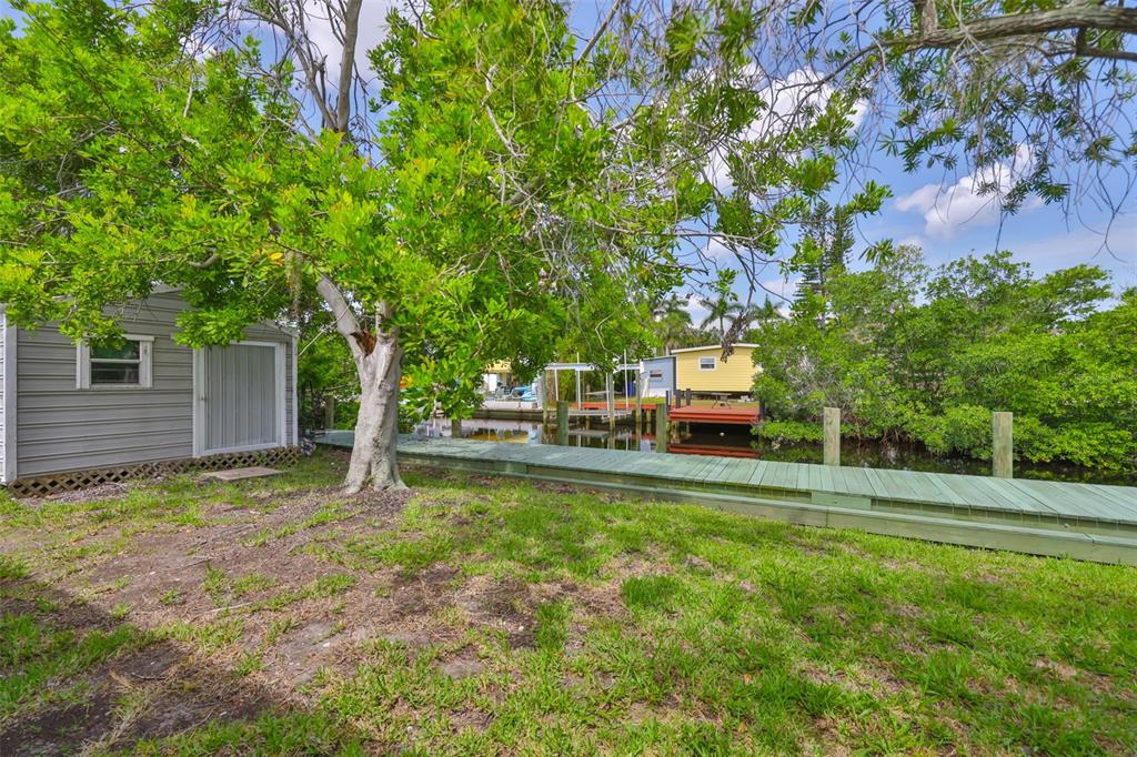 106 West North Branch Road Ruskin, FL 33570 - Photo 24 of 29 a house with trees in the background