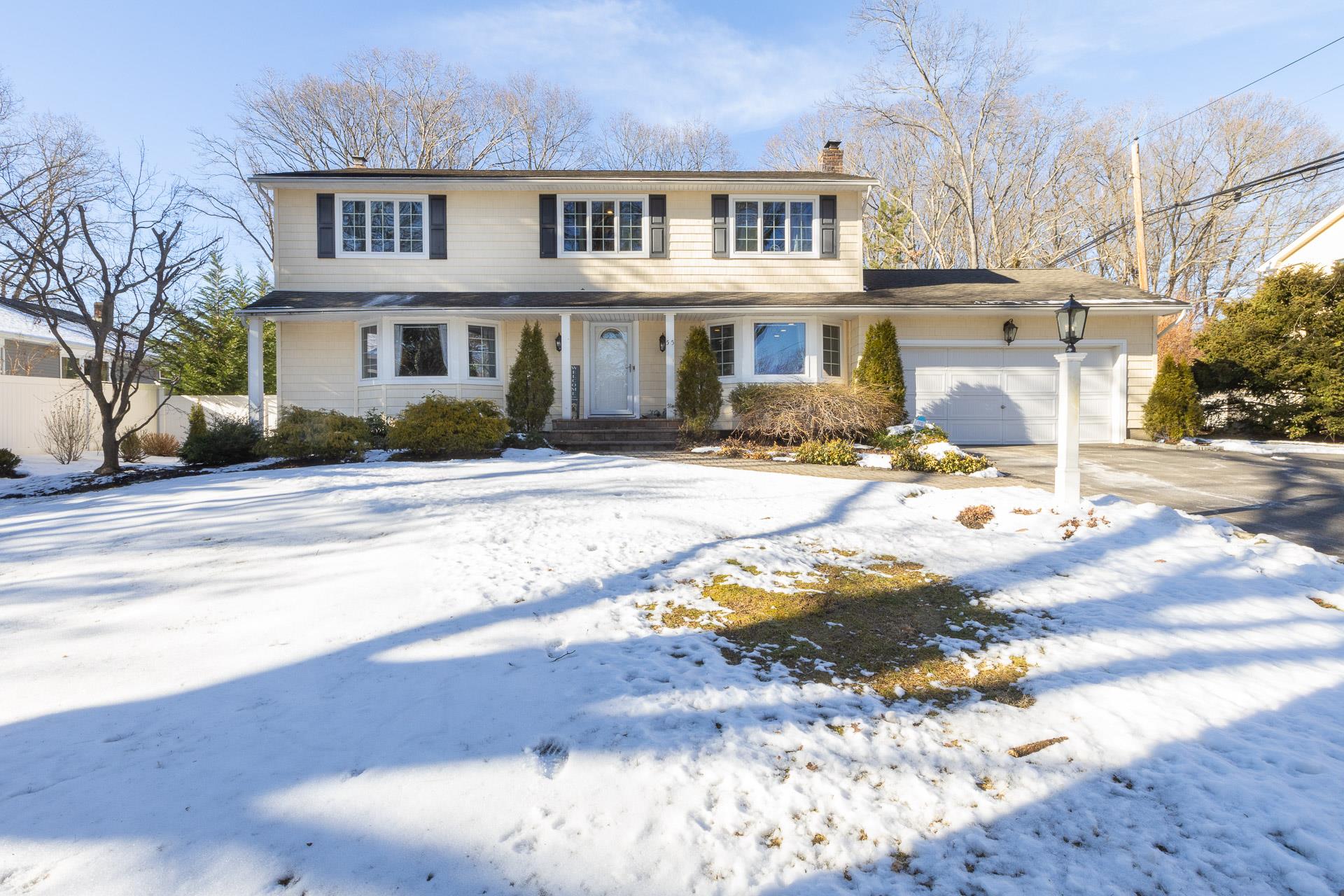 Front of property featuring a garage