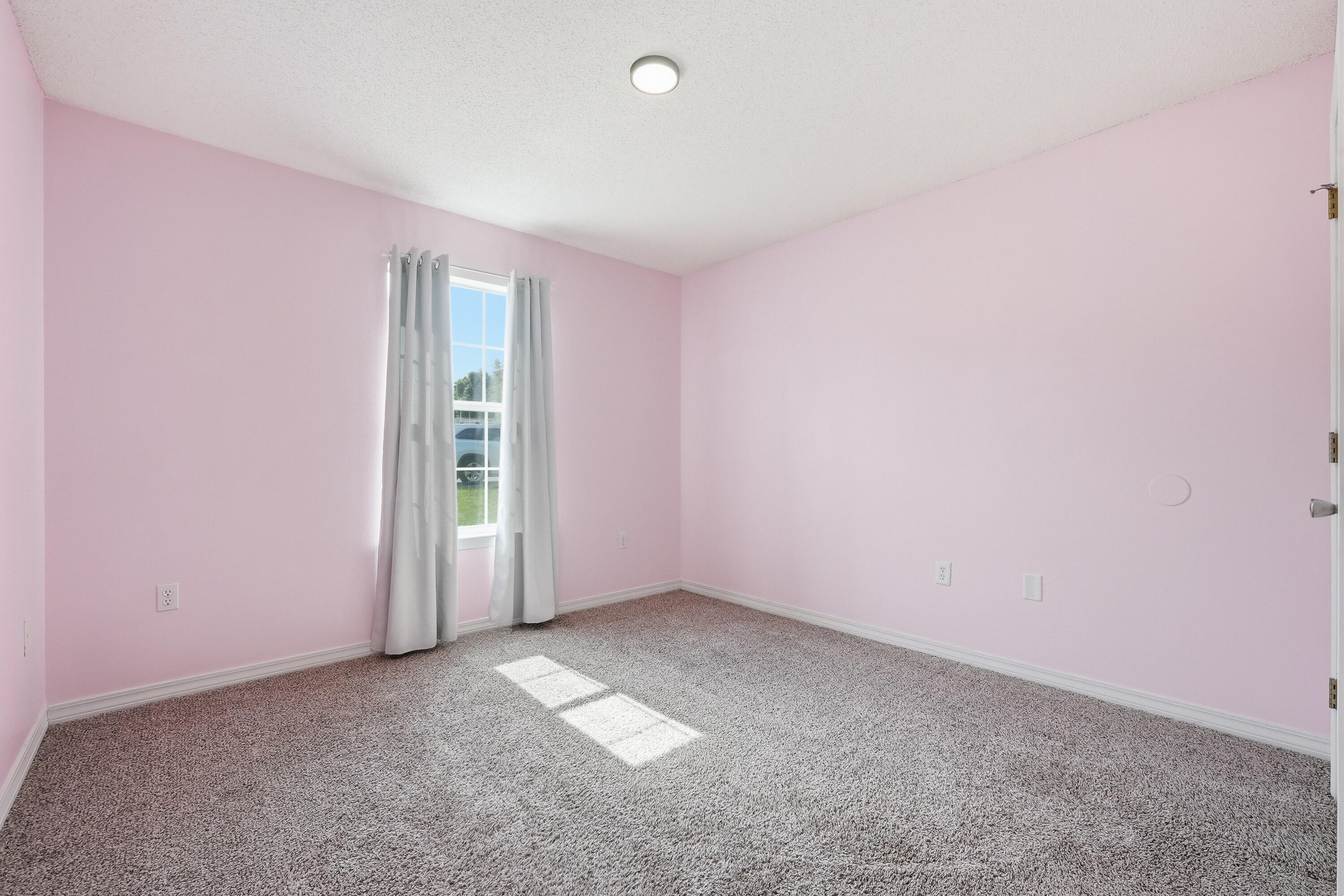 3033 Cabela Lane Crestview, FL 32539 - Photo 24 of 32 an empty room with windows