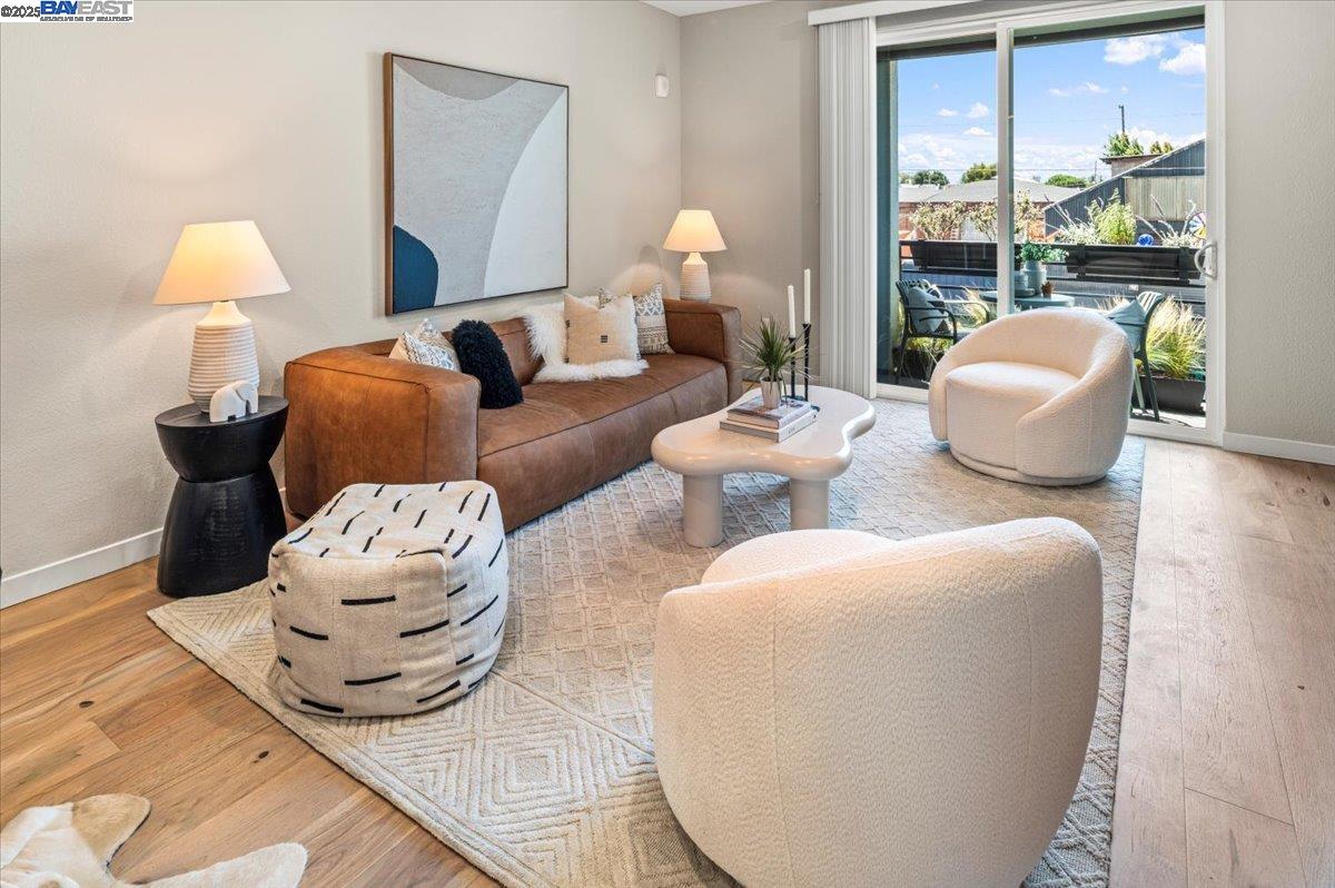 a living room with furniture and a lamp