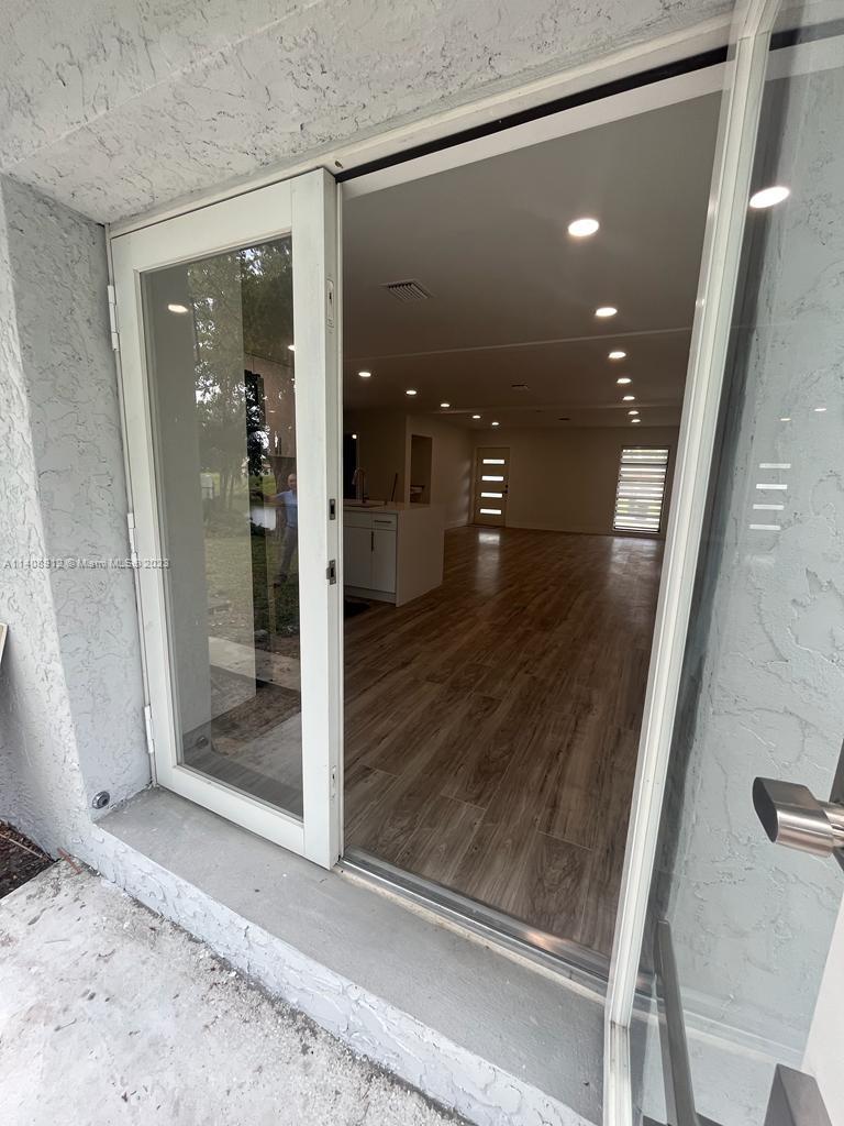Heathgate Street Tamarac, FL 33321 - Photo 23 of 23 a view of a hallway