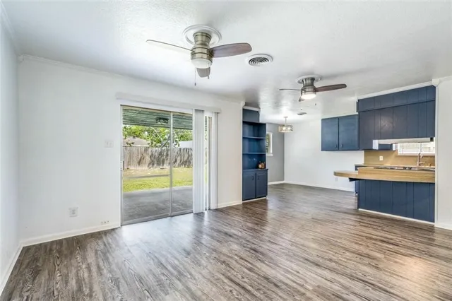 a view of a kitchen and a sink