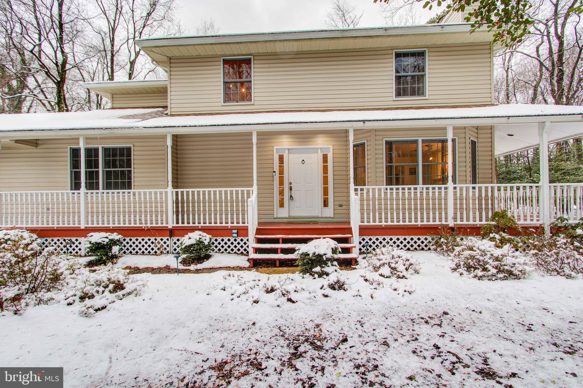 Front of home with beautiful wrap around porch