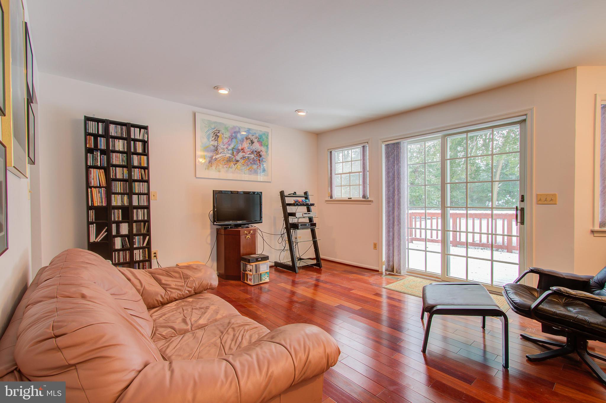 8308 Patapsco Road Pasadena, MD 21122 - Photo 12 of 25 Glass sliding door leads to outdoor deck