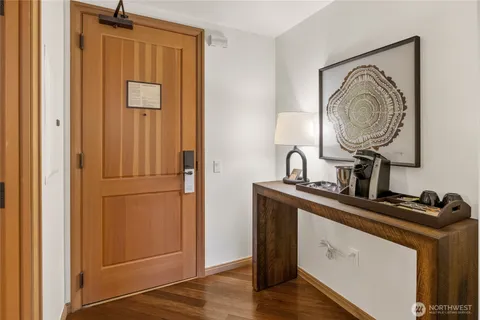 a view of a storage and utility room with a sink