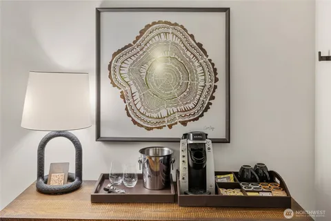 a kitchen with sink and cabinets