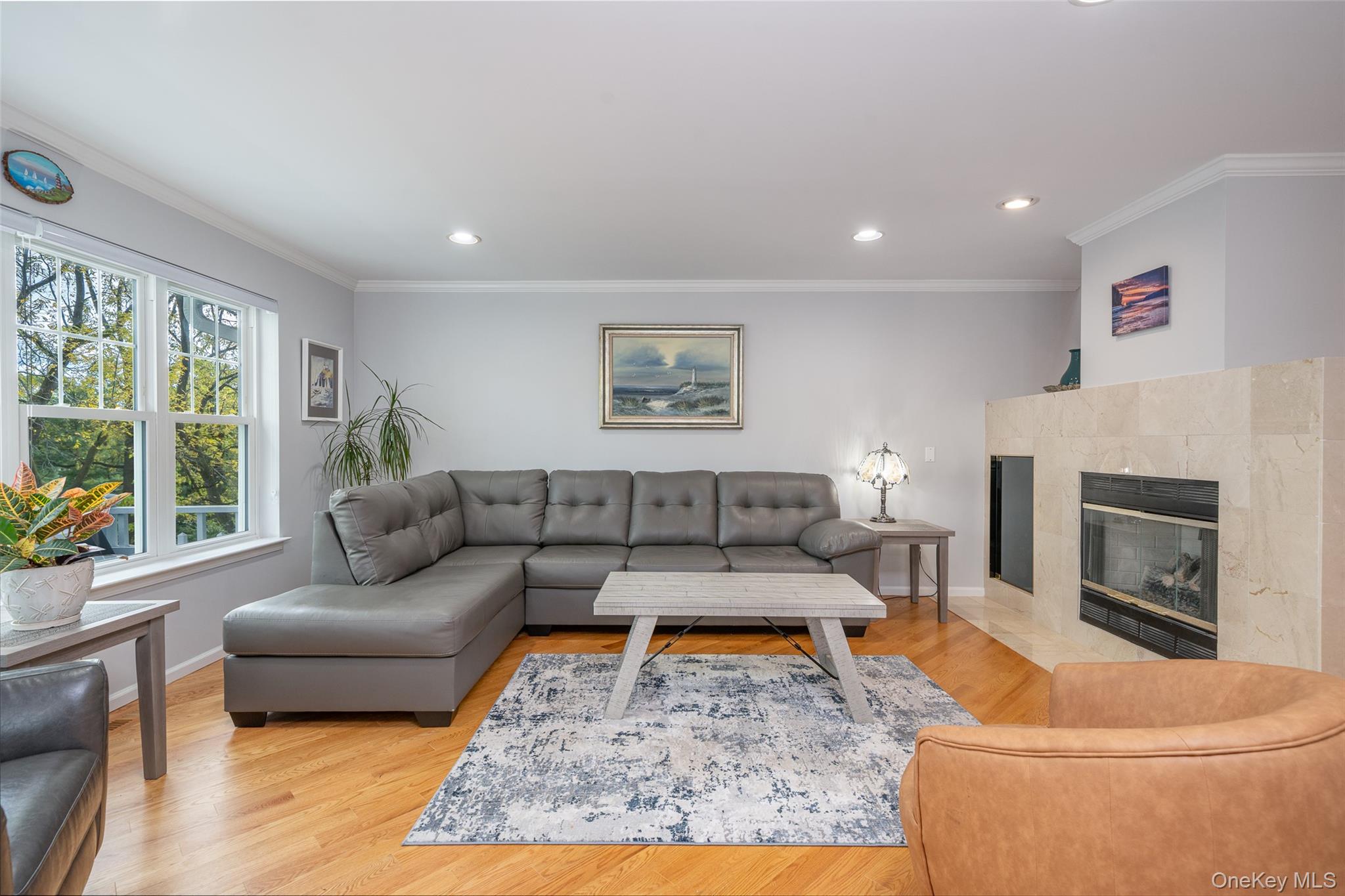 9 High Ridge Road Ossining, NY 10562 - Photo 15 of 50 a living room with furniture and a fireplace