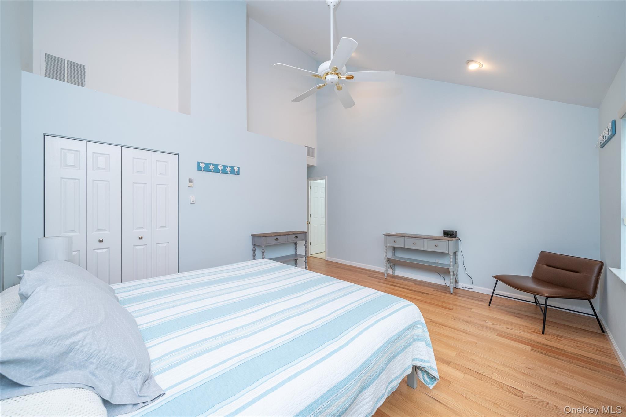 9 High Ridge Road Ossining, NY 10562 - Photo 19 of 50 a bedroom with a bed and a chair