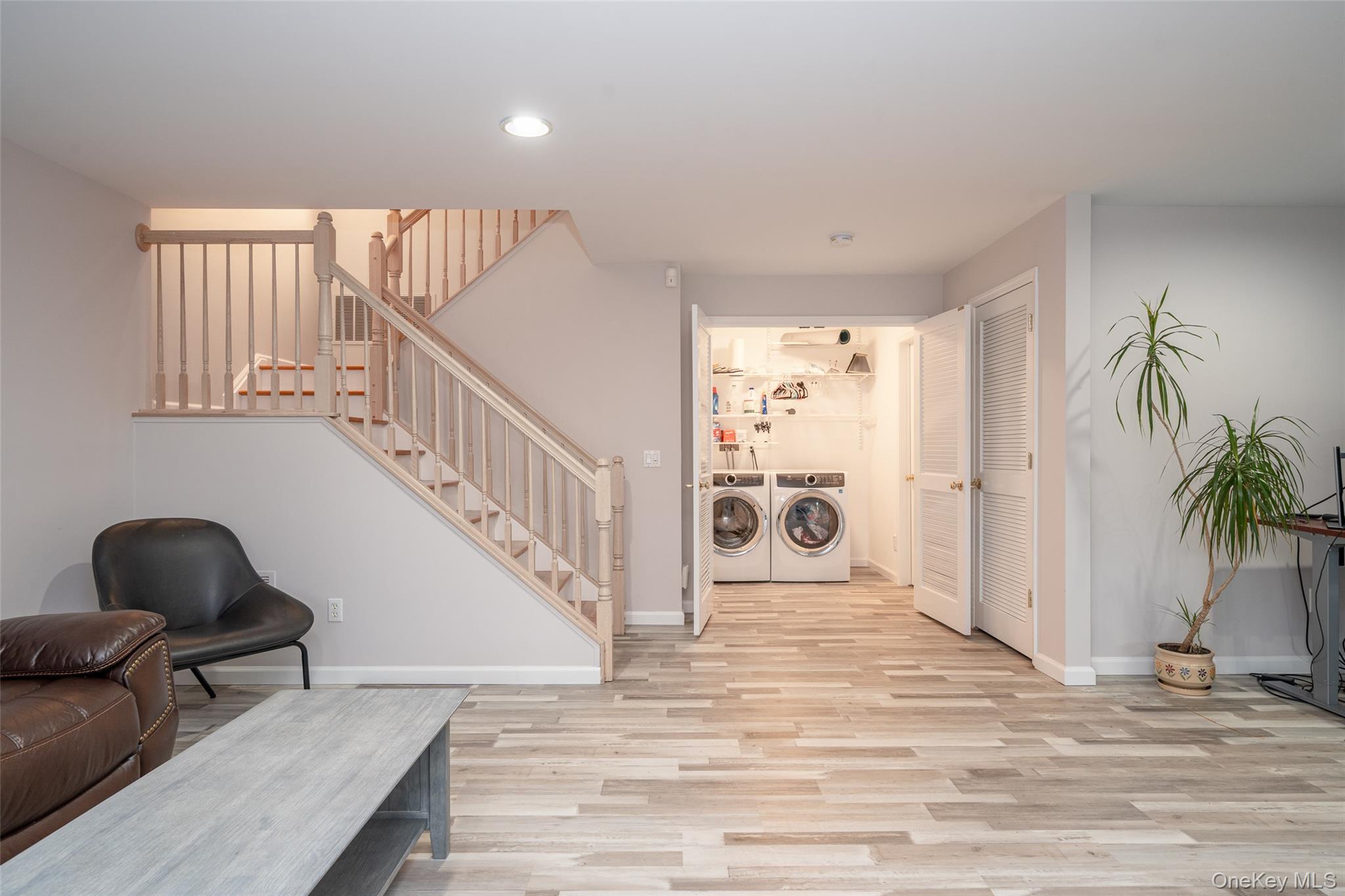 9 High Ridge Road Ossining, NY 10562 - Photo 25 of 50 a view of a livingroom with wooden floor and a potted plant