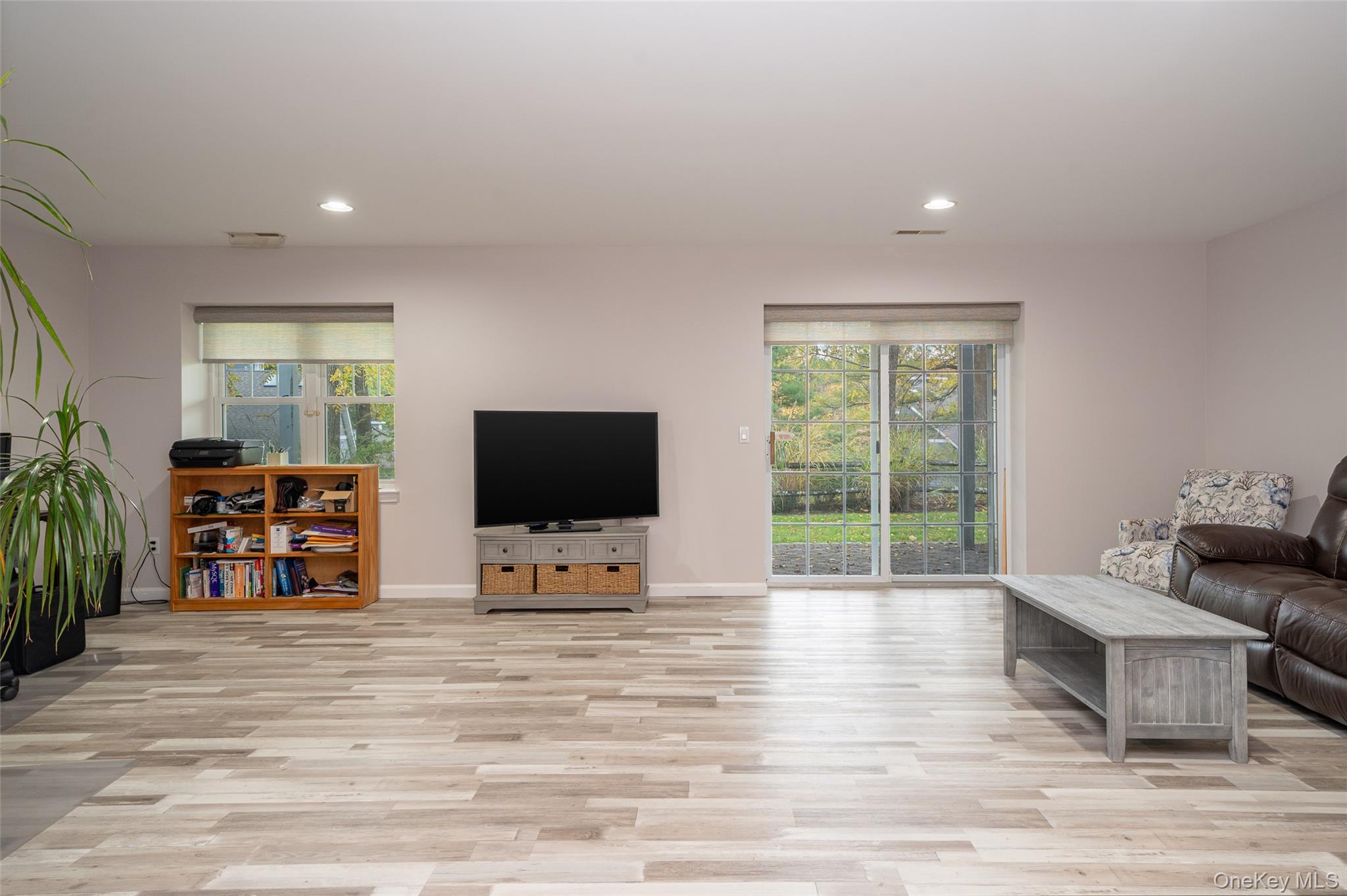 9 High Ridge Road Ossining, NY 10562 - Photo 26 of 50 a living room with furniture and a flat screen tv