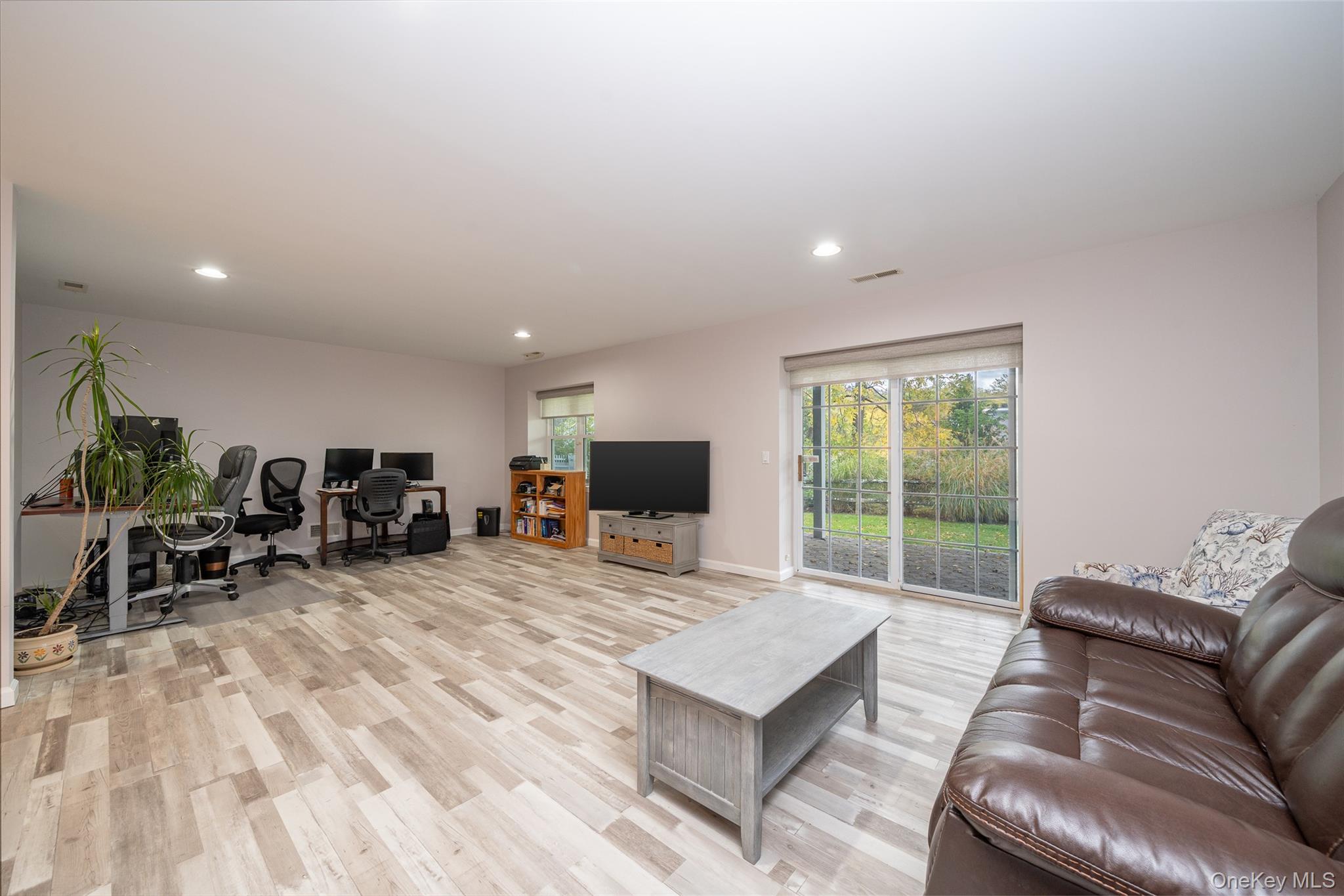 9 High Ridge Road Ossining, NY 10562 - Photo 27 of 50 a living room with furniture a table and a large window