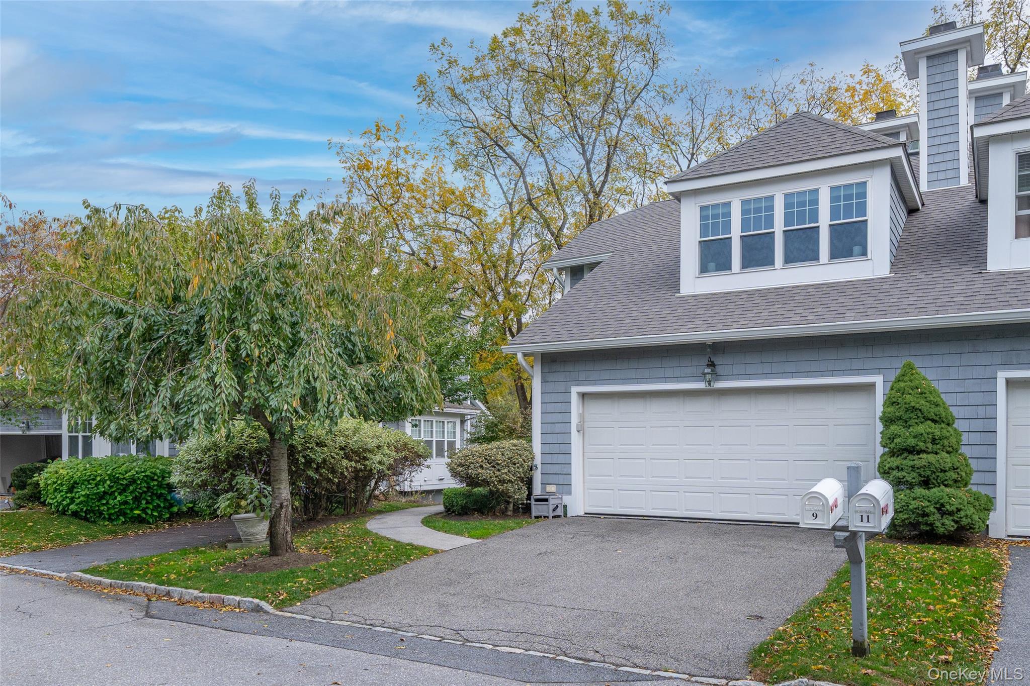9 High Ridge Road Ossining, NY 10562 - Photo 32 of 50 a front view of a house with garden