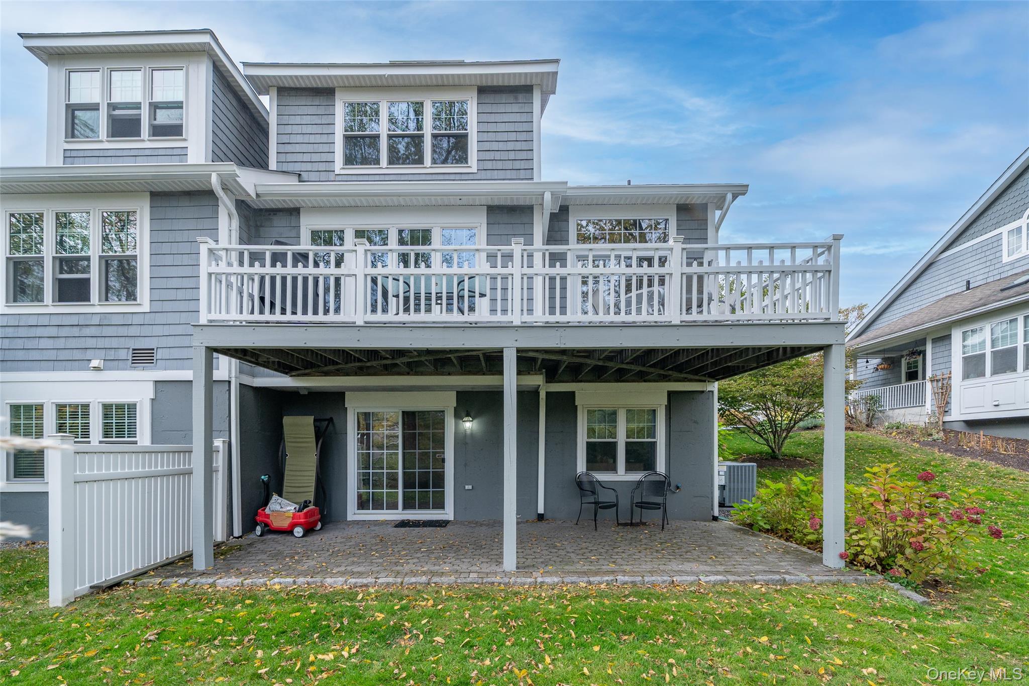 9 High Ridge Road Ossining, NY 10562 - Photo 36 of 50 a view of brick building with a large window and potted plants