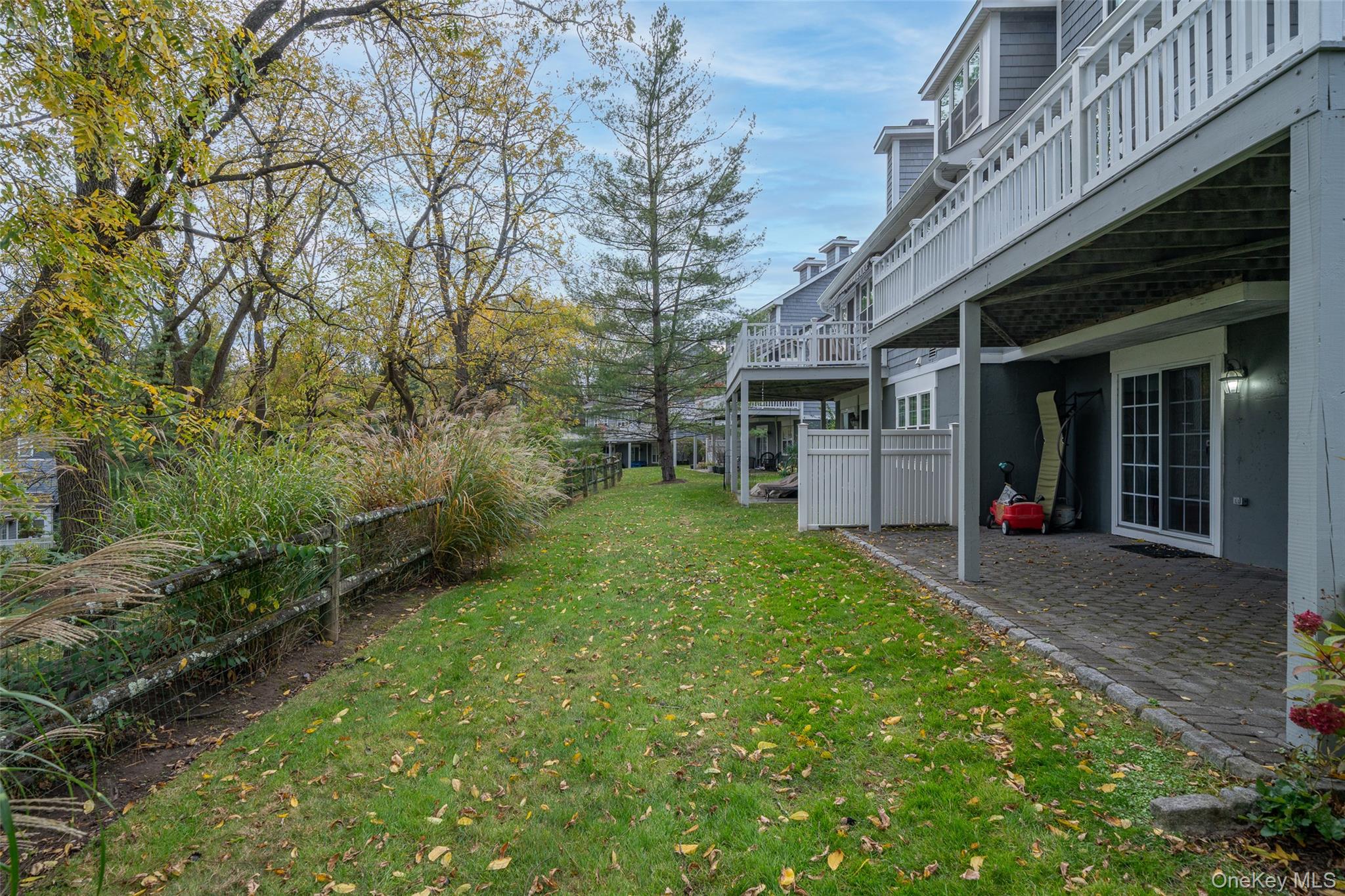 9 High Ridge Road Ossining, NY 10562 - Photo 37 of 50 a view of a backyard with a large tree