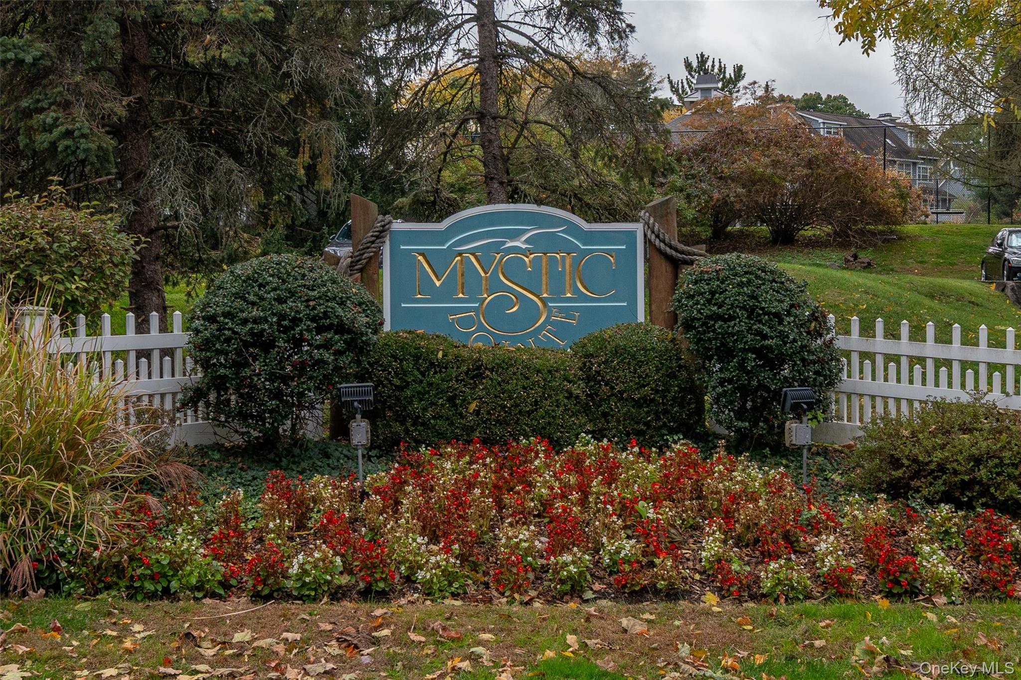 9 High Ridge Road Ossining, NY 10562 - Photo 39 of 50 a sign that is sitting in front of flowers