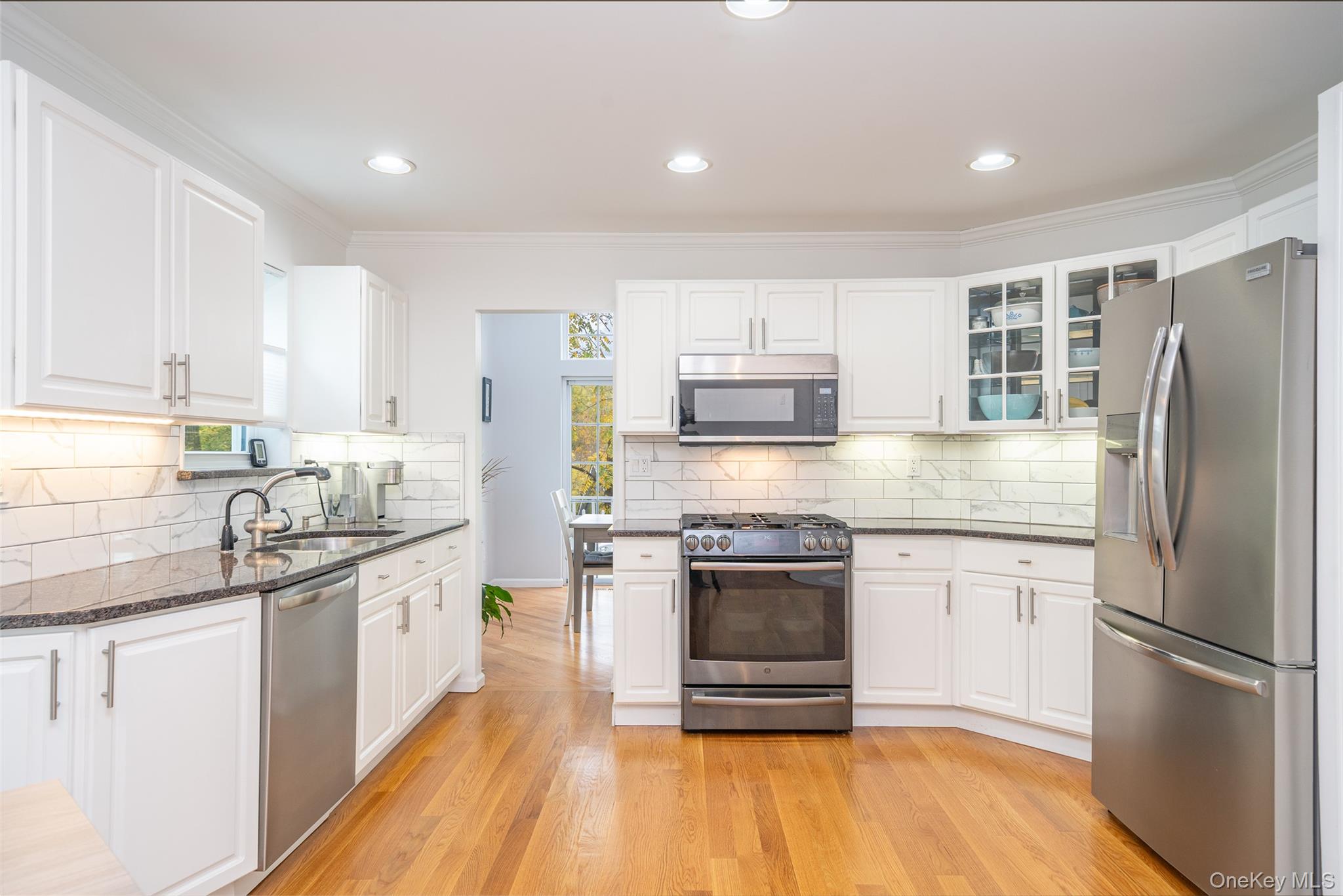 9 High Ridge Road Ossining, NY 10562 - Photo 5 of 50 a kitchen with stainless steel appliances granite countertop a refrigerator sink and stove