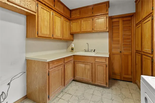 a utility room with a sink
