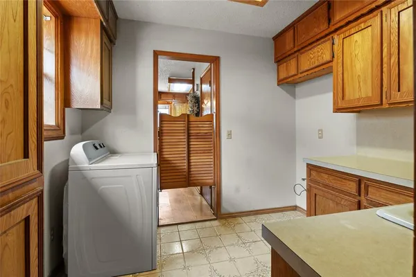 a room that has a washer and dryer