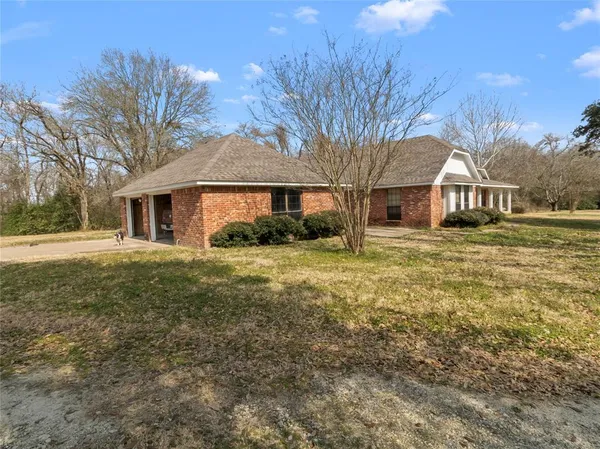 a front view of house with yard