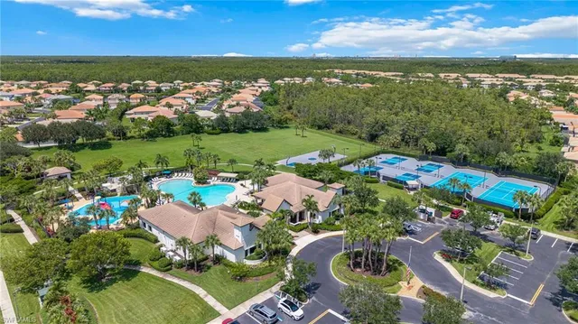 an aerial view of lake residential houses with outdoor space