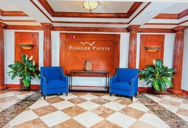 a outdoor space with a couch and potted plants