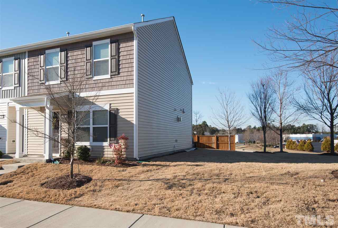2912 Berkeley Springs Place Raleigh, NC 27616 - Photo 2 of 19 a front view of a house with a yard