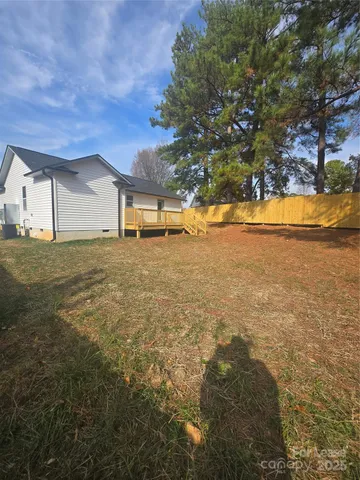 a view of a large body of water with a building in the background