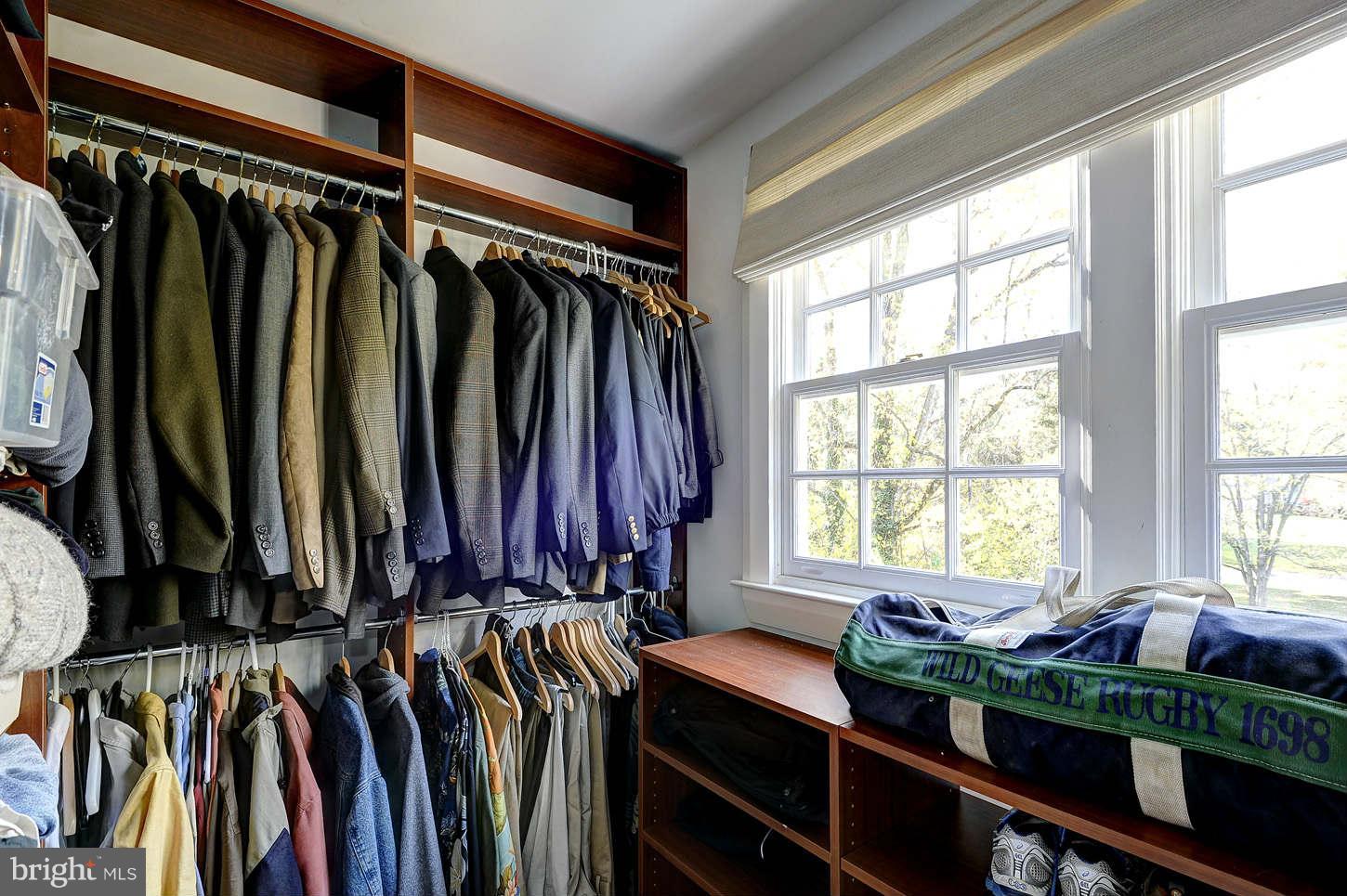 10017 Chapel Road Potomac, MD 20854 - Photo 14 of 26 a view of walk in closet with clothes and shoes