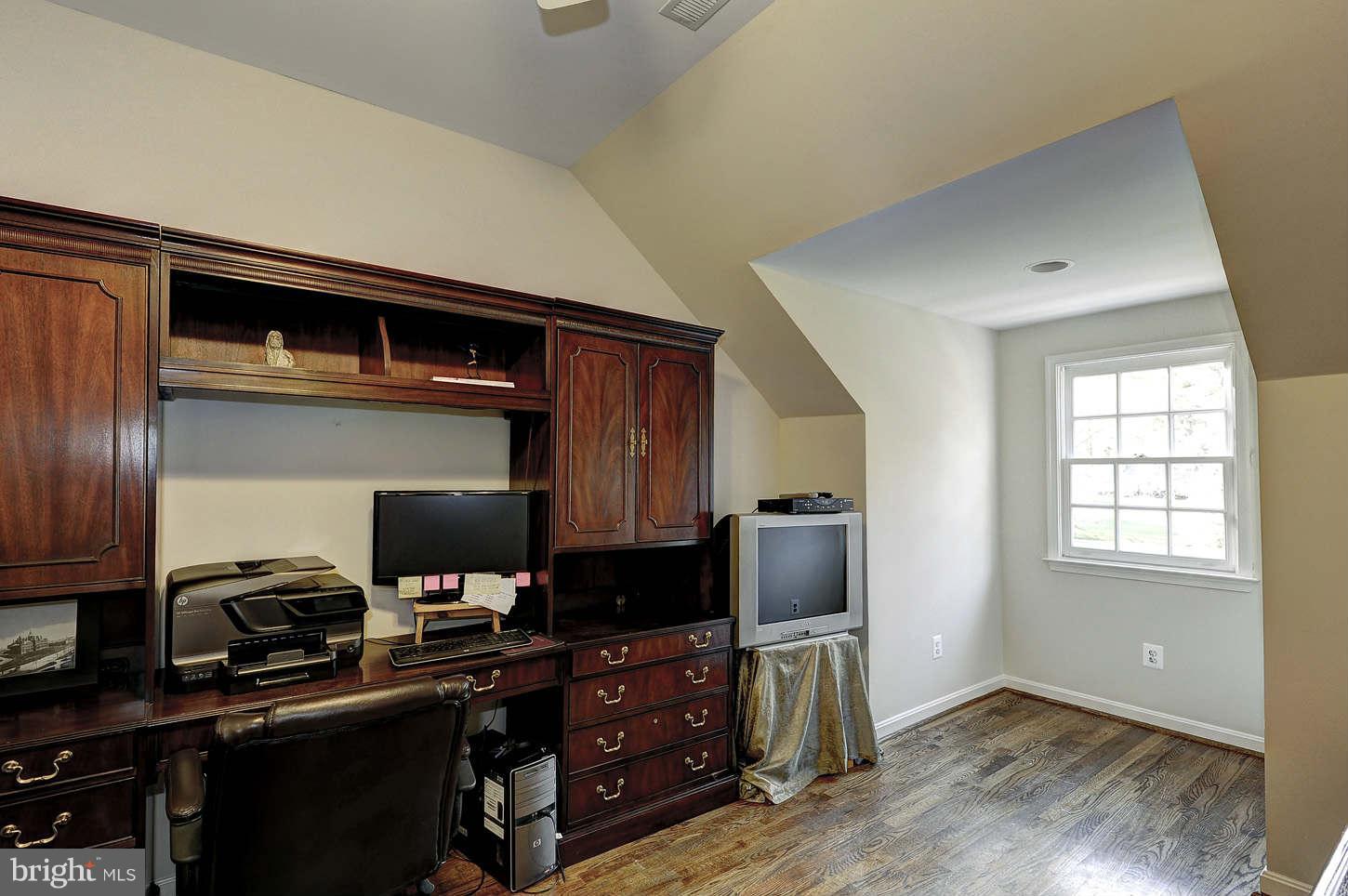 10017 Chapel Road Potomac, MD 20854 - Photo 20 of 26 a workspace with furniture and wooden floor