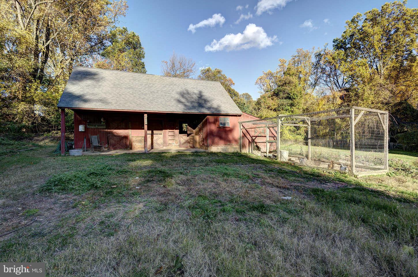 10017 Chapel Road Potomac, MD 20854 - Photo 23 of 26 a view of a house with a backyard