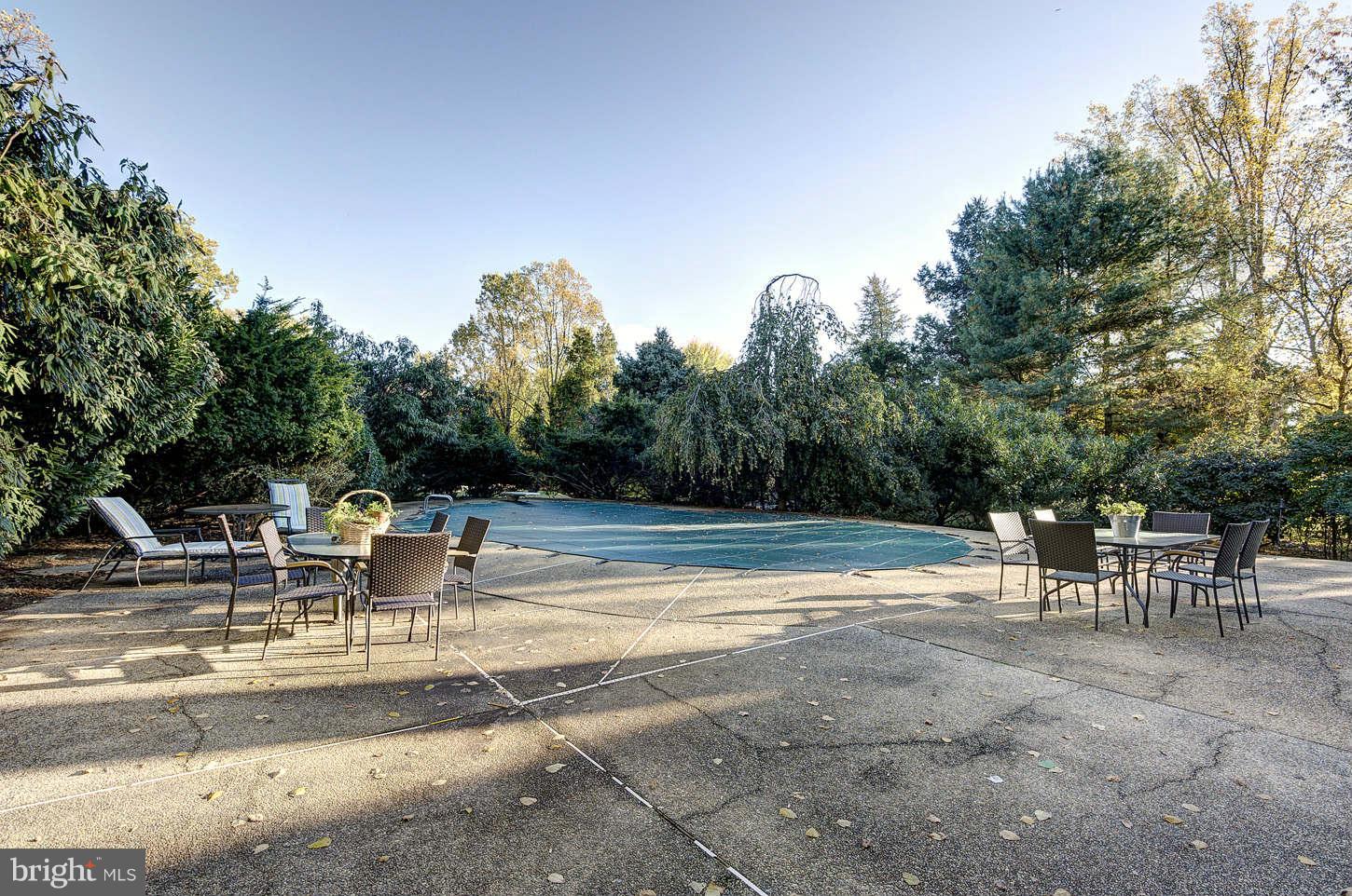 10017 Chapel Road Potomac, MD 20854 - Photo 26 of 26 a view of a yard with swimming pool and sitting area