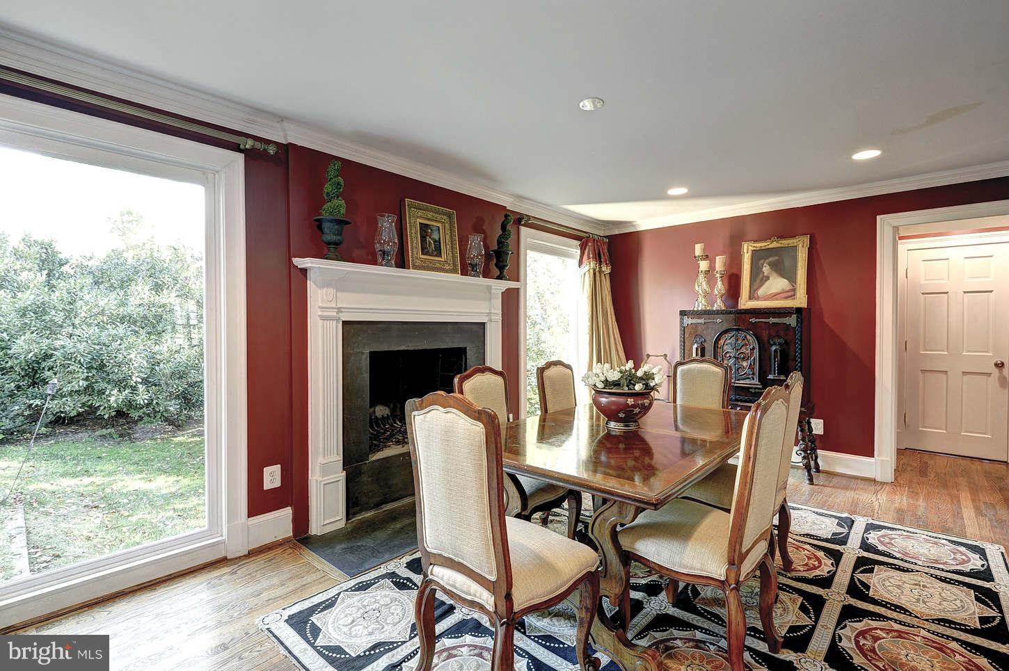 10017 Chapel Road Potomac, MD 20854 - Photo 5 of 26 a view of a dining room with furniture window and wooden floor