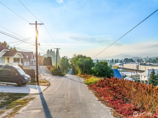 a street view with tall buildings