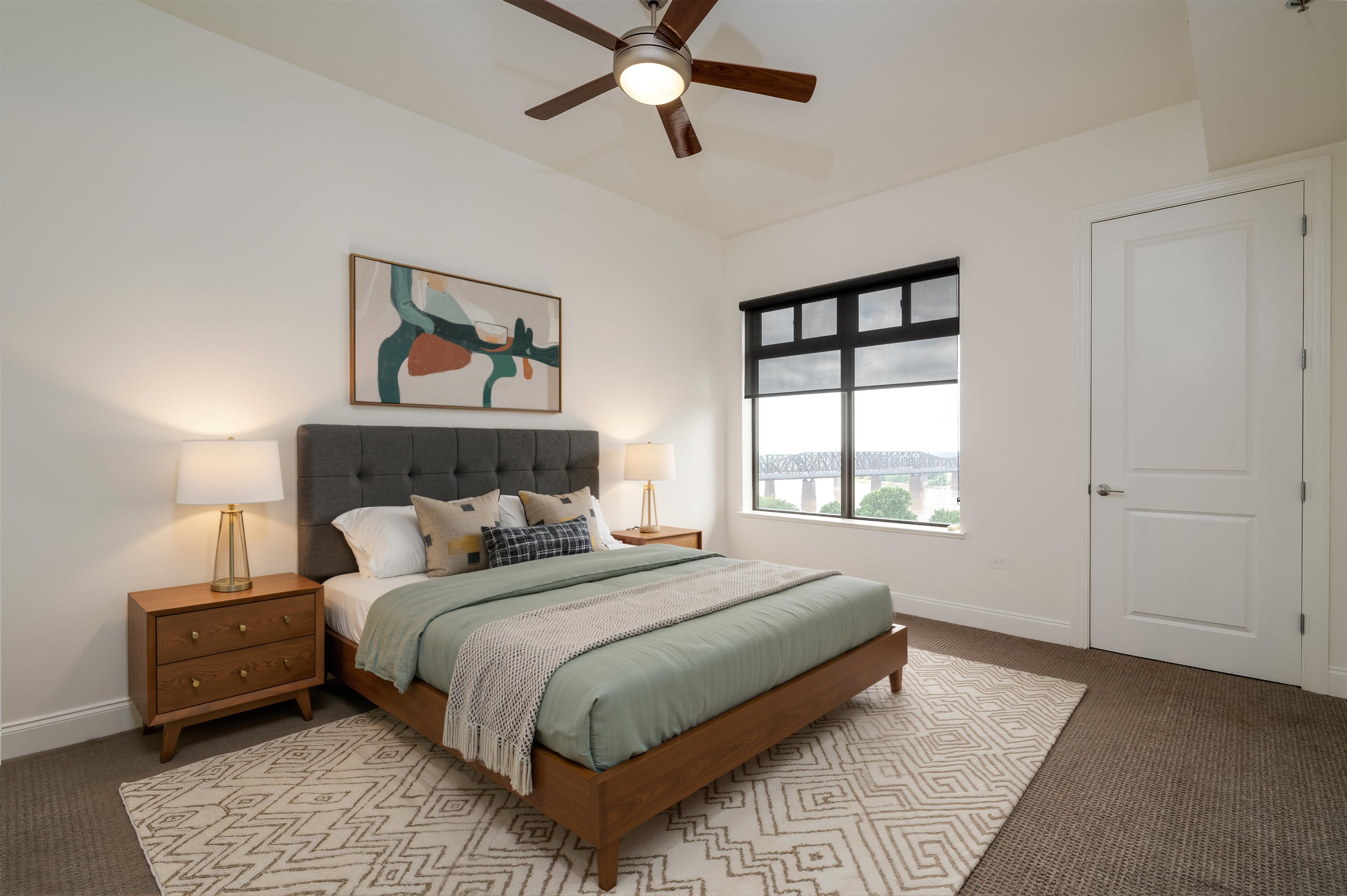 717 Riverside Drive, Unit 1108 Memphis, TN 38103 - Photo 14 of 39 a bedroom with a bed and a window