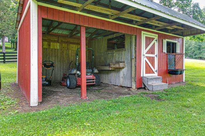 4675 Everal Lane Franklin, TN 37064 - Photo 12 of 15 a front view of a house with a yard