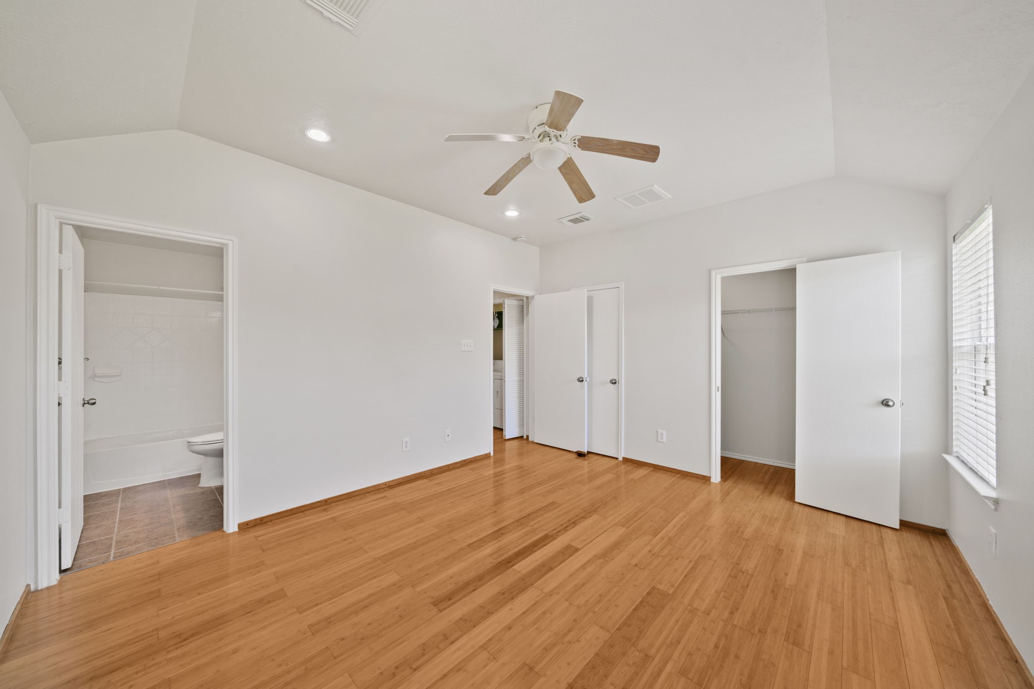 14323 Brunswick Point Lane Houston, TX 77047 - Photo 18 of 33 a view of empty room with wooden floor