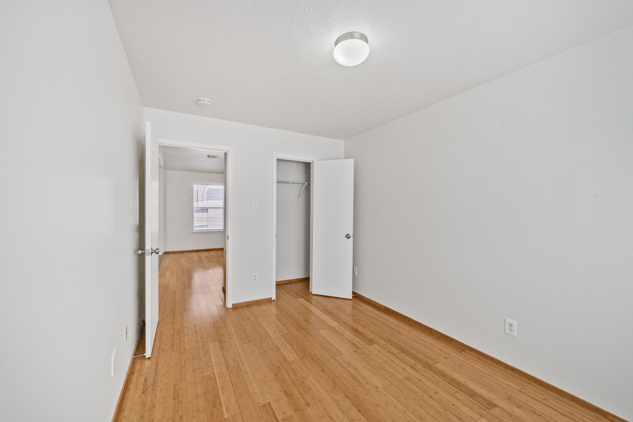 14323 Brunswick Point Lane Houston, TX 77047 - Photo 25 of 33 a view of hallway with wooden floor