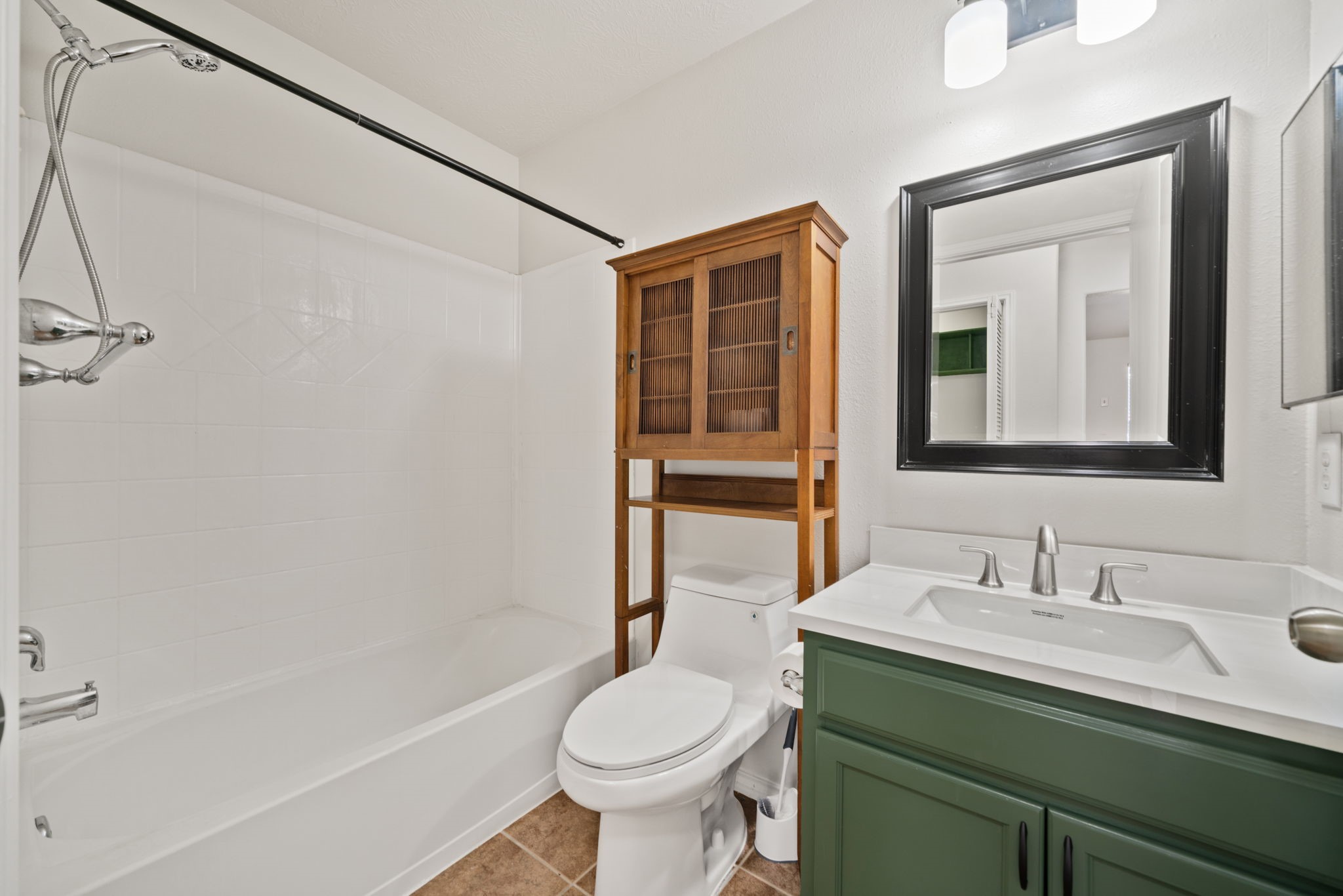 14323 Brunswick Point Lane Houston, TX 77047 - Photo 28 of 33 a bathroom with a sink toilet and shower
