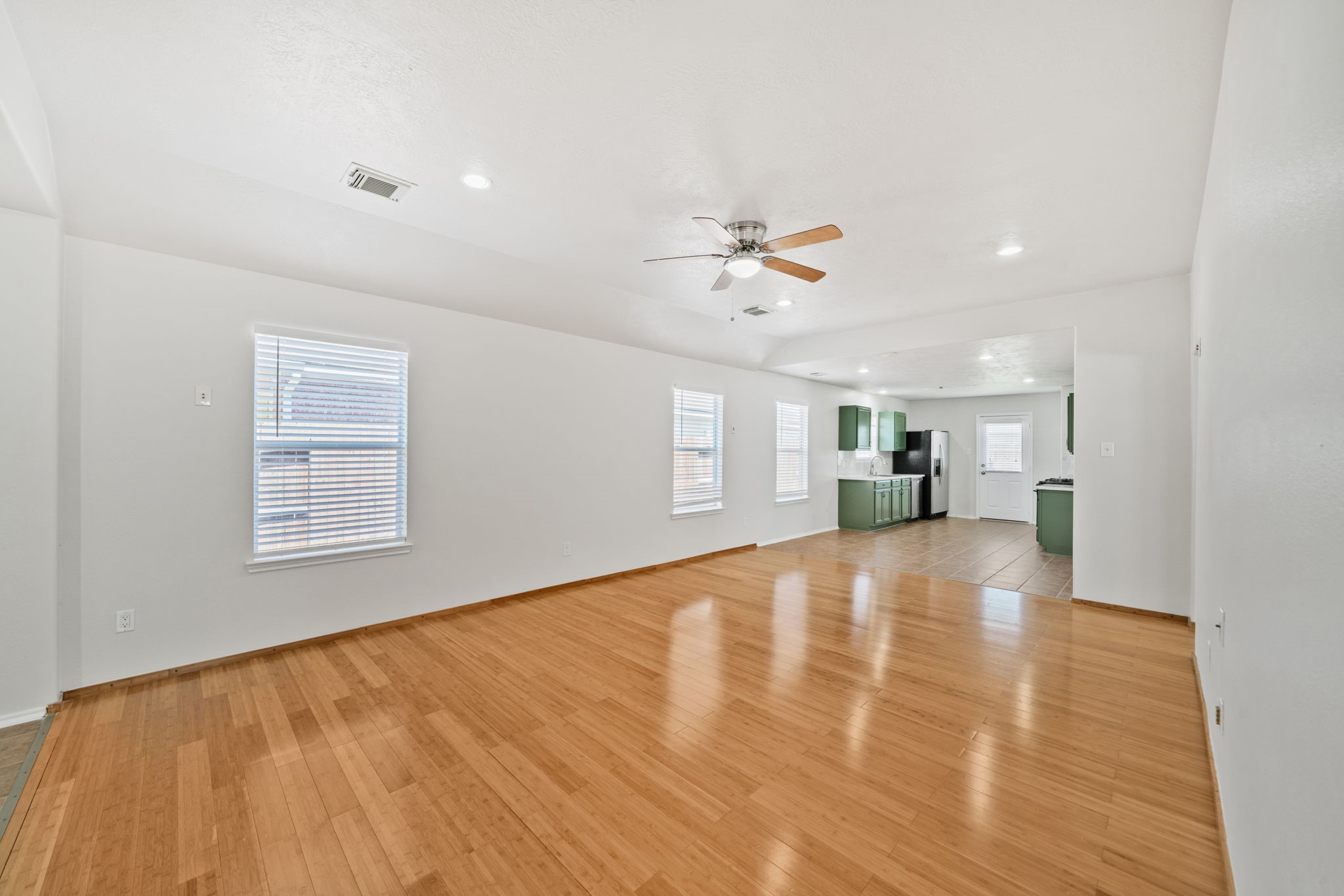 14323 Brunswick Point Lane Houston, TX 77047 - Photo 8 of 33 a view of an empty room with a window