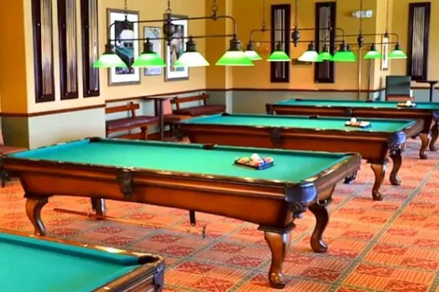 an aerial view of residential houses with outdoor space and river