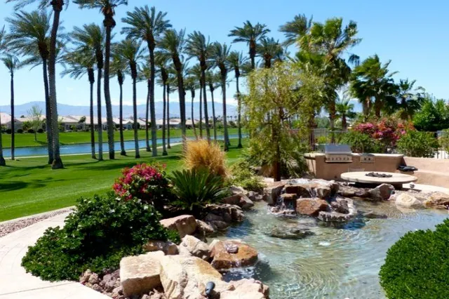 a view of a golf course with a lake