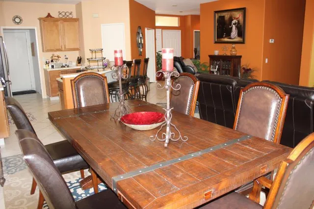 a view of a dining room with furniture
