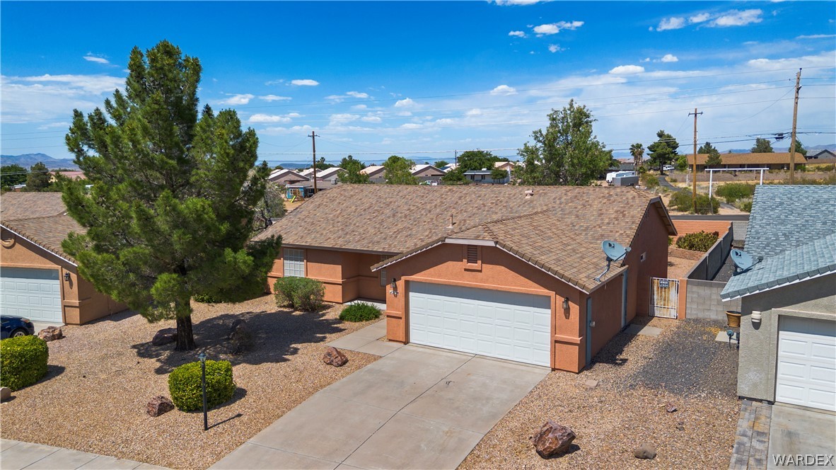 2158 Ranch Road Kingman, AZ 86401 - Photo 2 of 48 a view of house with outdoor space and sitting area