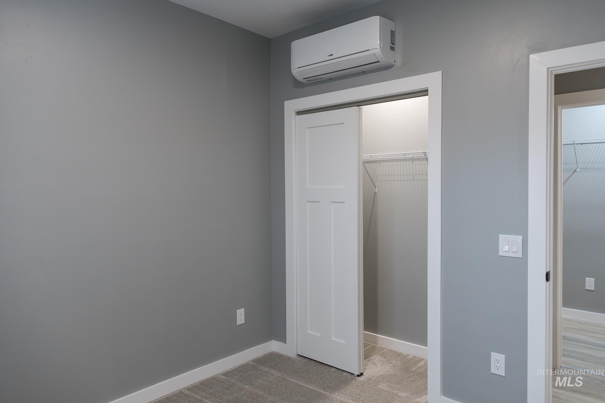 287 Southwest 6th Street, Unit 2 Ontario, OR 97914 - Photo 19 of 37 Unfurnished bedroom with a closet and light colored carpet